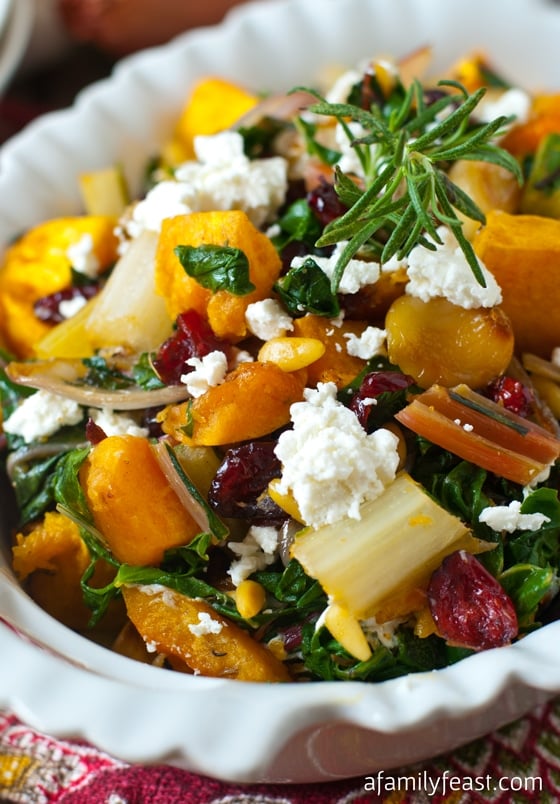 Roasted Butternut Squash and Swiss Chard - One of our favorite ways to enjoy butternut squash - with sauteed Swiss chard, roasted garlic, caramelized onion and pine nuts and dried cranberries. YUM!