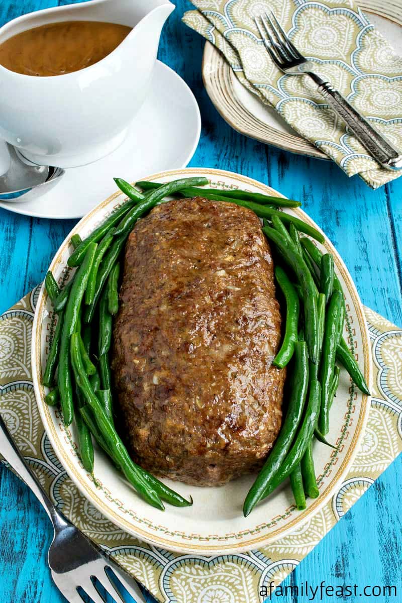 My husband Jack's Meatloaf with Gravy - An easy recipe for moist, delicious meatloaf with gravy. A comfort food classic!