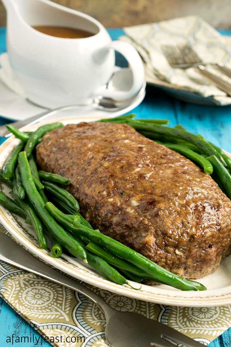 My husband Jack's Meatloaf with Gravy - An easy recipe for moist, delicious meatloaf with gravy. A comfort food classic!