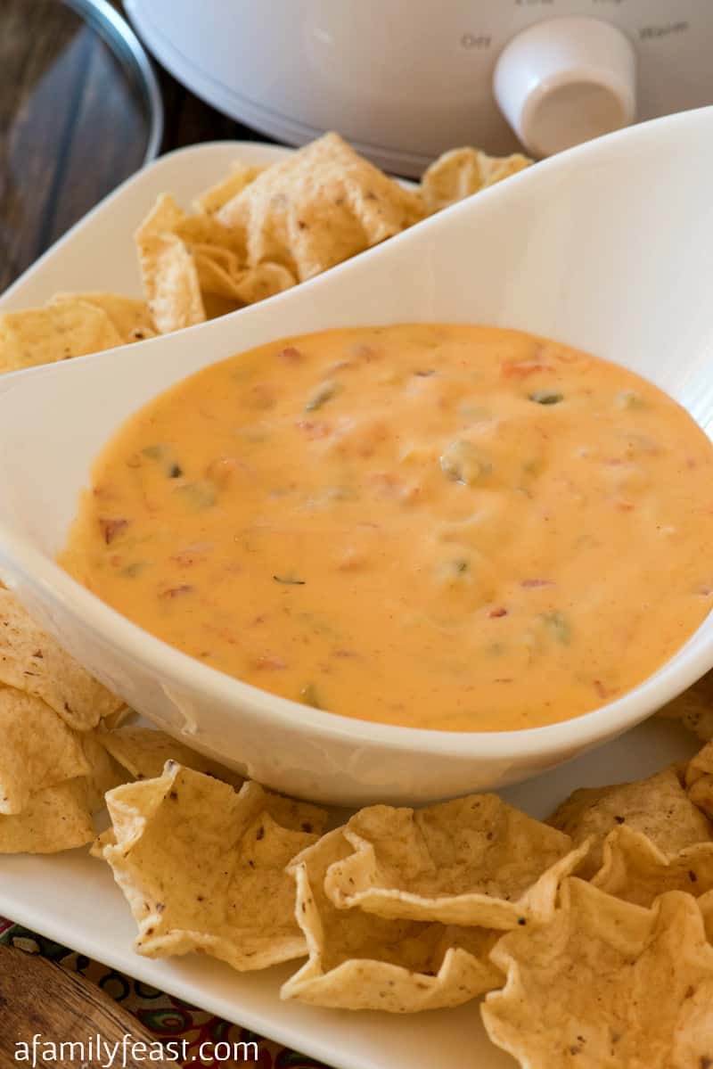 Chile con Queso - Creamy, cheesy and zesty! This easy dip is addictively good!