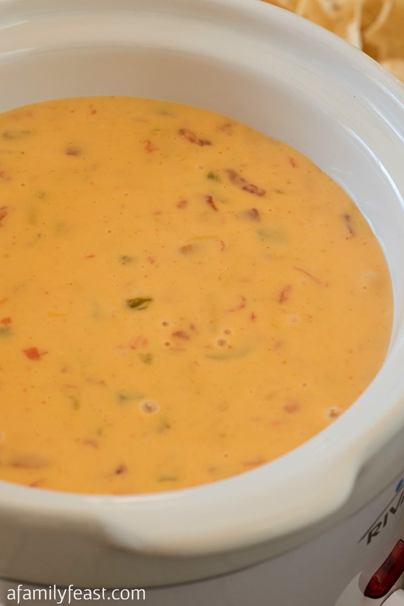 Chile con Queso - Creamy, cheesy and zesty! This easy dip is addictively good!