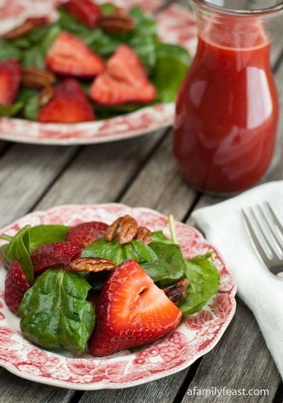 Spinach Strawberry Salad with Strawberry Vinaigrette - An amazing salad with spinach, fresh strawberries and toasted pecans - plus a delicious strawberry vinaigrette.