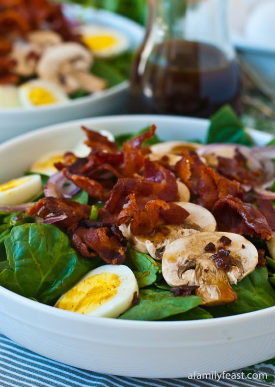 A delicious Spinach Salad recipe with an amazing Warm Bacon Dressing.