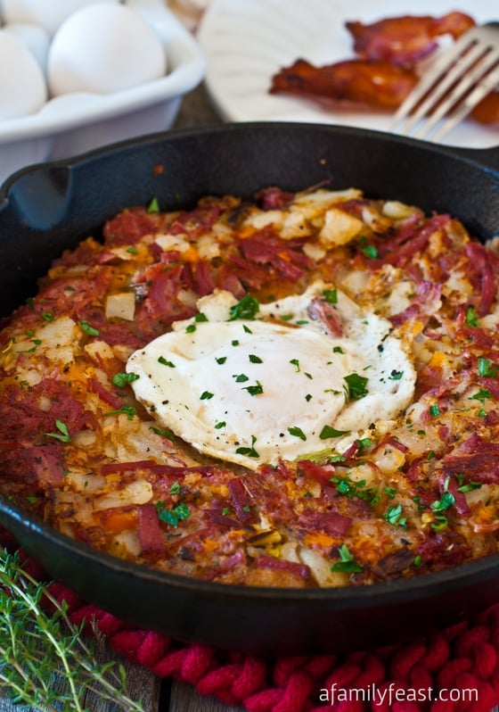 Corned Beef Breakfast Hash - Great for a brunch crowd or holiday breakfast. Flavorful combination of corned beef, white and sweet potatoes, and leeks for a ton of flavor!