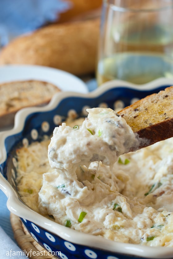 Hot Crab Dip with Crostini - A wonderful, warm and cheesy crab dip served with toasted crostini.