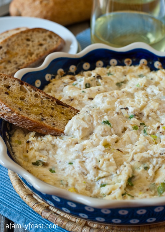 Hot Crab Dip with Crostini - A wonderful, warm and cheesy crab dip served with toasted crostini.