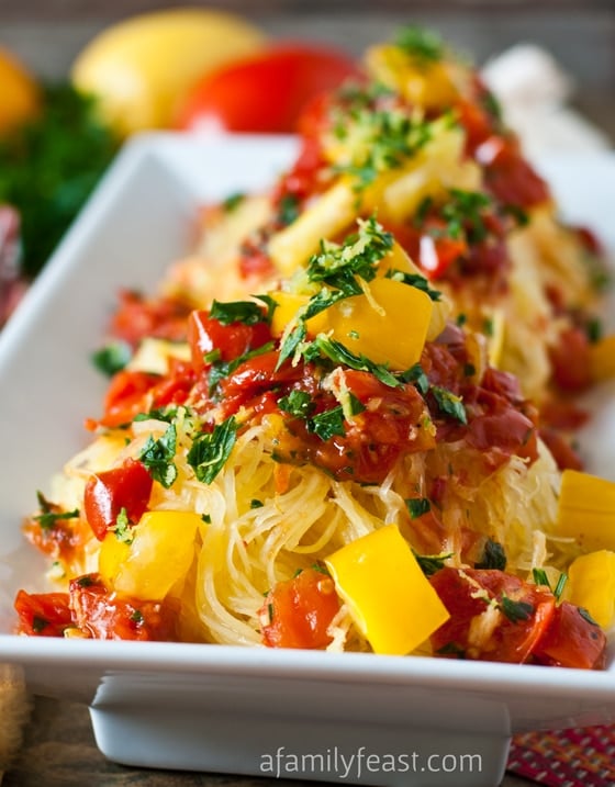 Spaghetti Squash Gremolata - Tender roasted spaghetti squash tossed with pan roasted tomatoes and a wonderful gremolata of lemon zest, garlic and parsley. This recipe is amazing!