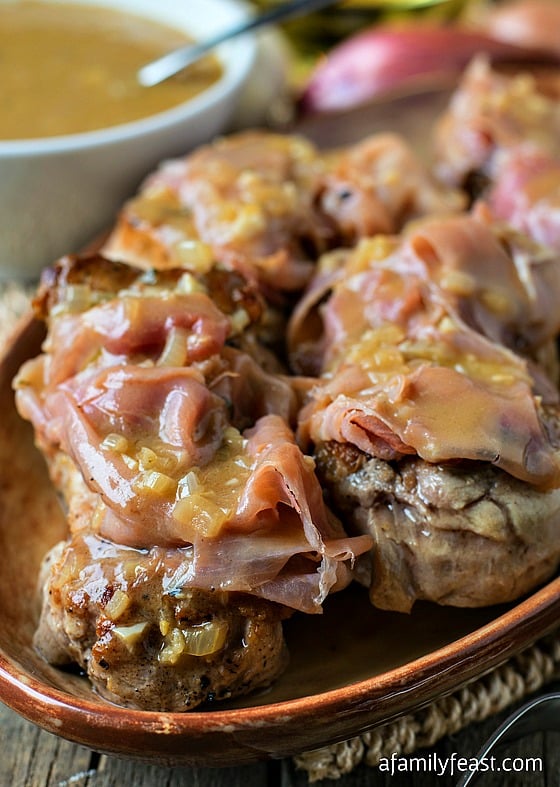 Pork Medallions Portuguese - Tender pork tenderloin smothered in a wonderful sauce and thinly sliced prosciutto. This dish is fantastic!