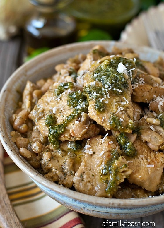 Pesto Chicken over Sautéed Cannellini Beans - A hearty, low-carb dinner that is quick and easy to make!