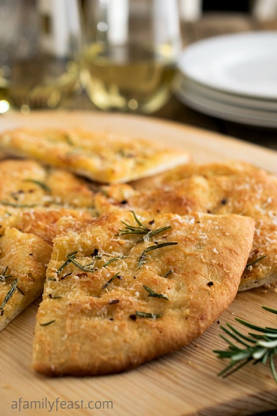 Rosemary Flatbread - An easy and delicious flatbread with fantastic flavor! Can be served as an appetizer or as a light main course served alongside a healthy salad.