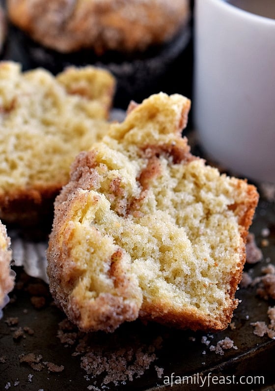 Sour Cream Coffee Cake Muffins - The perfect breakfast muffin! Super moist and delicious thanks to sour cream in the batter and a sweet streusel is baked inside the muffin as well as sprinkled on top!