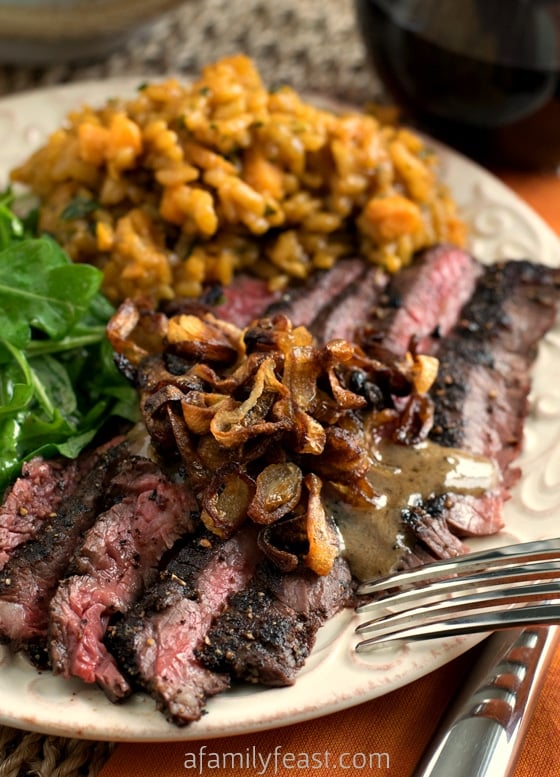 Steak au Poivre with Crispy Shallots - Tender peppercorn encrusted peppercorn steak with caramelized, crispy shallot and a wonderful cognac sauce. OMG - this is delicious!