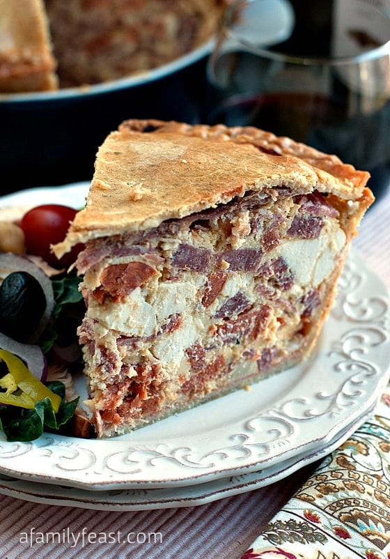 A classic Italian recipe for Easter Pie (Pizza Giana) - a dense, delicious pie filled with Italian Meats and Cheeses with a thick crust.