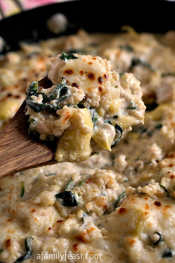 This recipe for Quinoa with Spinach, Artichokes and Chicken is pure, creamy and cheesy comfort food!