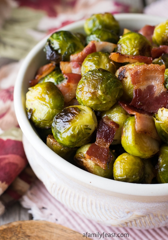 Oven Roasted Brussels Sprouts with Bacon - A simple and super flavorful recipe! Perfect side dish for a special holiday meal.