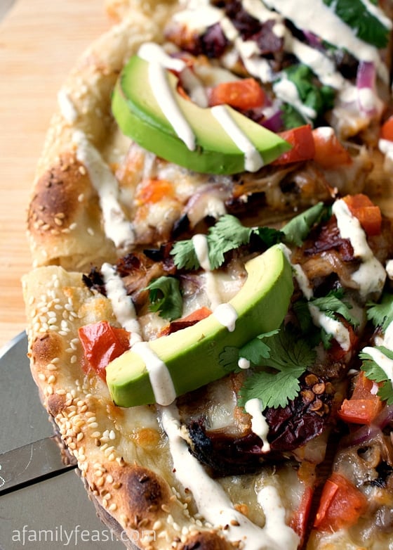 Cemita Pulled Pork Pizza - The commonly used flavors and ingredients of a cemita sandwich – turned it into a pizza with layer upon layer of fantastic zesty flavors!