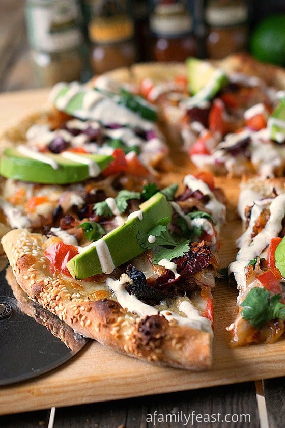 Cemita Pulled Pork Pizza - The commonly used flavors and ingredients of a cemita sandwich – turned it into a pizza with layer upon layer of fantastic zesty flavors!