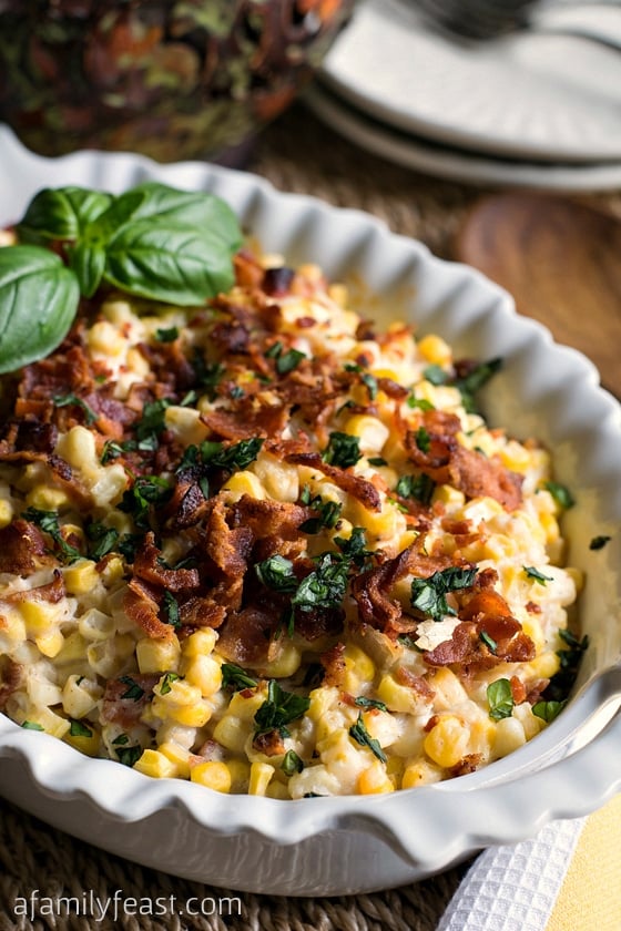 Corn and Bacon Casserole - Fresh corn kernels and bacon in a light and creamy sauce that has been flavored with garlic and basil. So good!