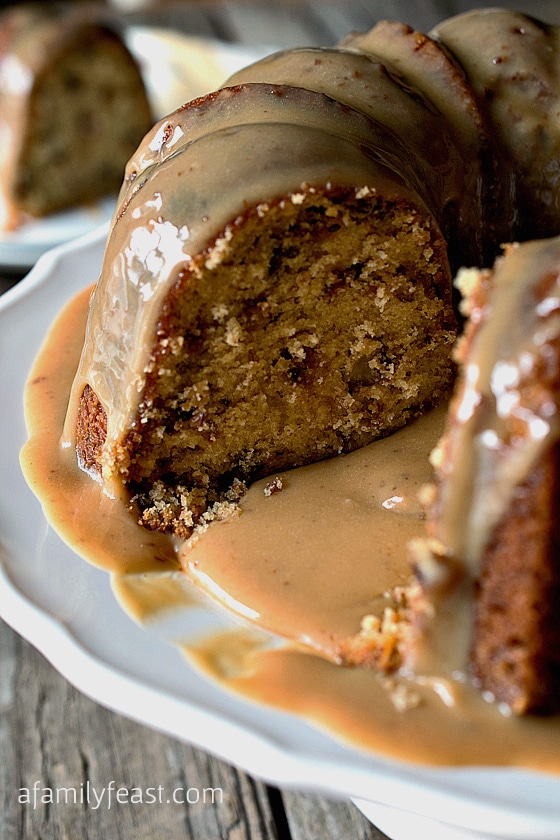 Toffee Pecan Bundt Cake with Caramel Drizzle recipe - A moist and delicious cake that is filled with toffee bits and pecans with an amazing caramel drizzle frosting!