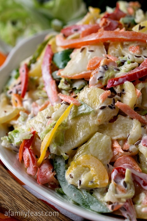 Sweet Bell Pepper Slaw with Pineapple - A delicious twist on the typical summer coleslaw recipe! You've got to try this recipe!