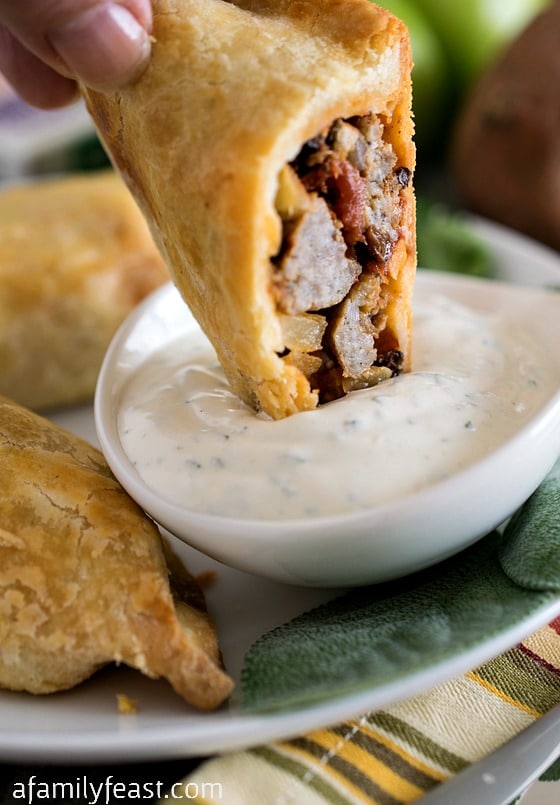 Sausage and Apple Empanadas - A super delicious (and easy!) empanadas recipe filled with sausage, apple, sweet potato, sage and other fantastic flavor!