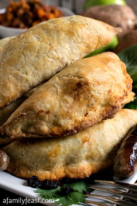 Sausage and Apple Empanadas - A super delicious (and easy!) empanadas recipe filled with sausage, apple, sweet potato, sage and other fantastic flavor!