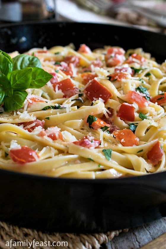 Fettuccine in Cream, Tomato & Basil Sauce - A simple and delicious recipe (similar to Fettuccine Alfredo) but with fresh and fantastic flavors!