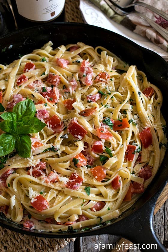 Fettuccine in Cream, Tomato & Basil Sauce - A simple and delicious recipe (similar to Fettuccine Alfredo) but with fresh and fantastic flavors!