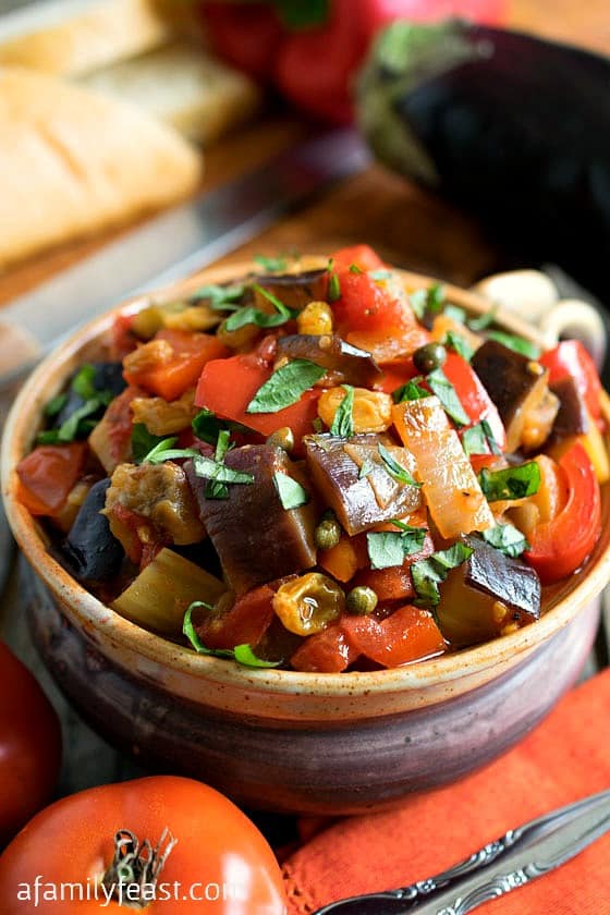 Caponata - A super flavorful and delicious Sicilian vegetable dish that is fantastic served hot or cold. Delicious spread on bread or as a side dish. 