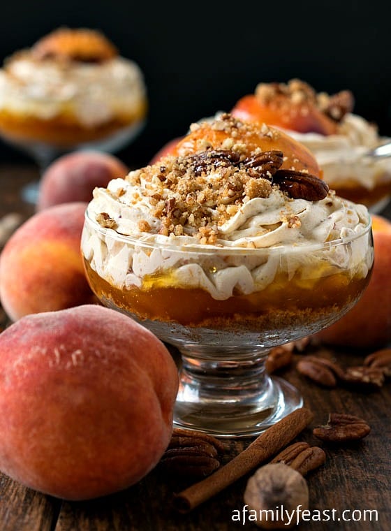 No-Bake Peach Cheesecake Mousse - A simple yet impressive dessert. Layers of sweet graham cracker crumbs, peach preserves, and a creamy and spicy peach cheesecake mousse!