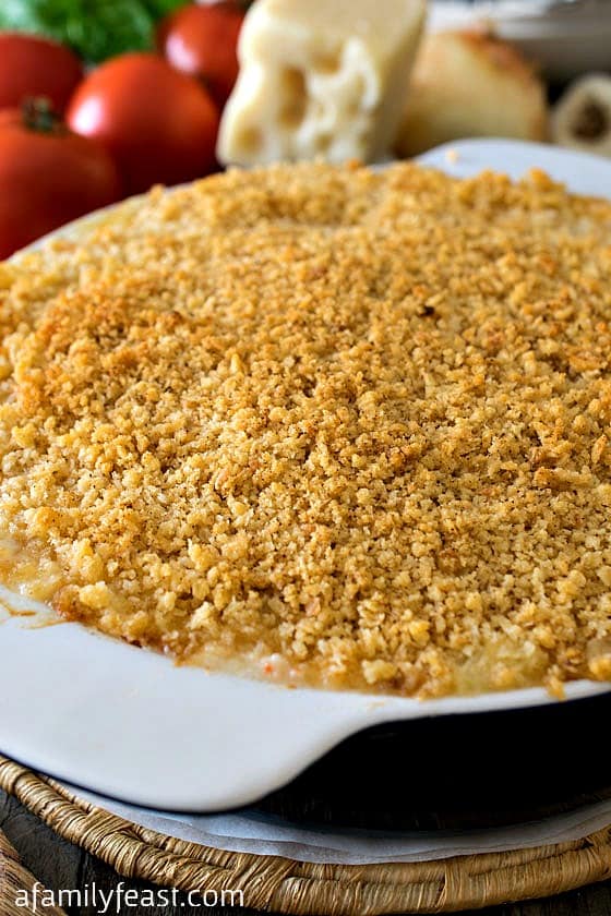 Fresh Tomato Au Gratin - Pure comfort food! This creamy, cheesy casserole is a delicious way to enjoy fresh summer tomatoes!