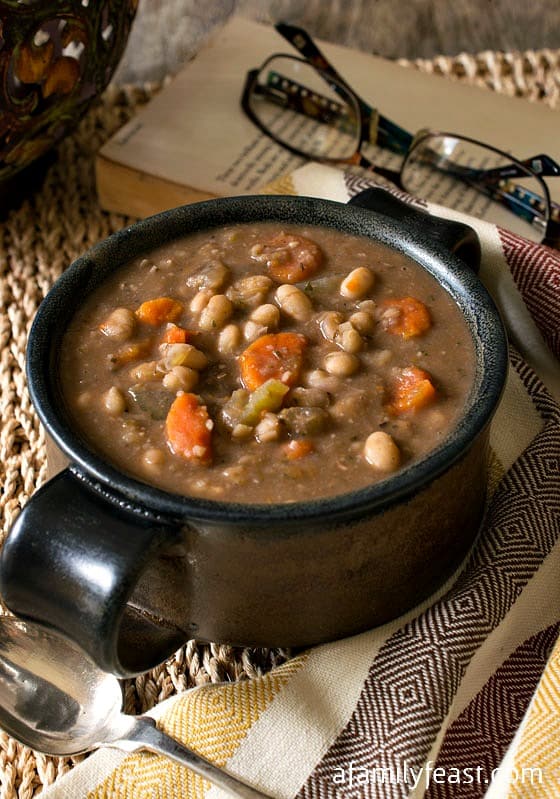 Slow Cooker Tuscan White Bean Soup - A simple, flavorful and hearty soup!