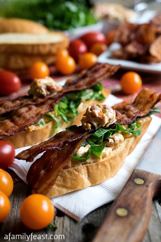 BLT Crostini with Boursin Cheese - A delicious appetizer that looks super fancy but is very easy to make! Rich roasted tomatoes, bacon and Boursin cheese on a toasted crostini. YUM!