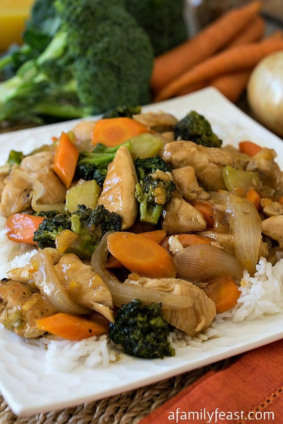 Orange Chicken and Vegetables - Chicken and vegetables smothered in a sweet and spicy orange sauce. Dinner is ready in less than 30 minutes!