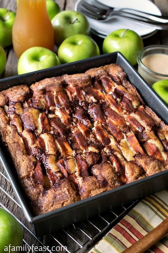 New England Apple Cider Cake - A simple, moist and delicious cake with a decadent, creamy apple cider glaze. A perfect fall dessert!