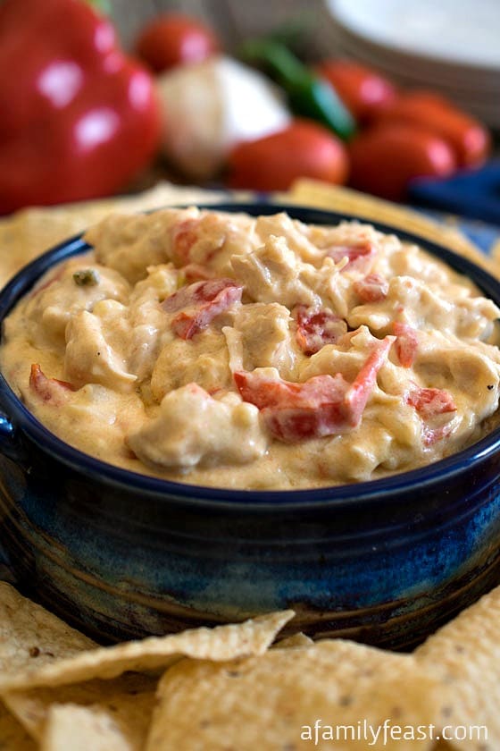 Creamy Chicken Queso Dip - A super easy and incredibly delicious chicken and cheese dip!