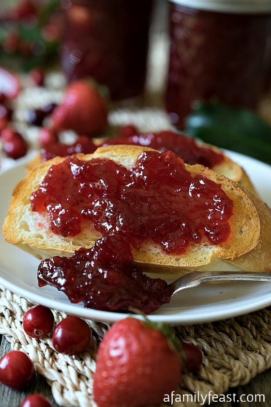 This Christmas Jam is a simple sweet-tart jam made from strawberries and cranberries. Recipe includes a FREE label printable for gift giving!