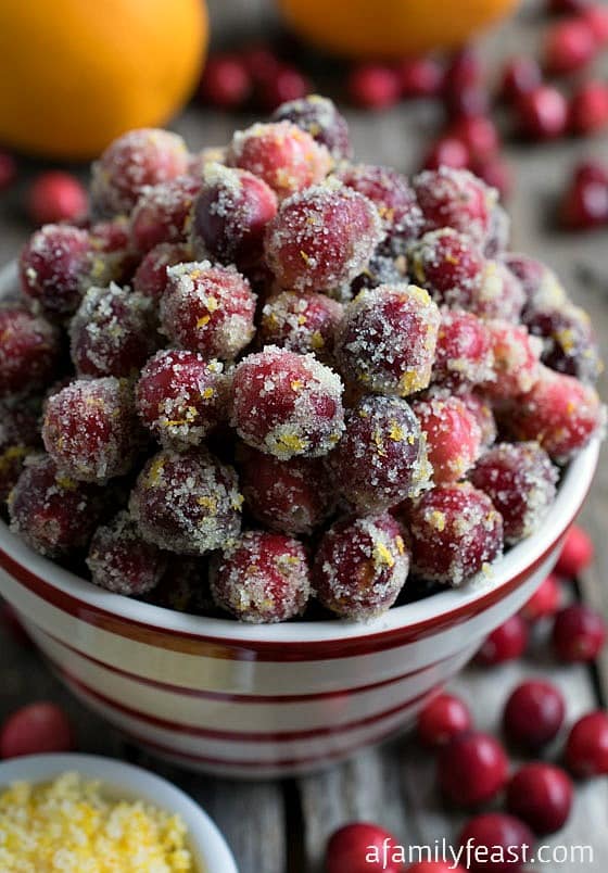 Orange Sugared Cranberries - A delicious, citrusy twist on the classic sugared cranberry recipe.  The orange flavor is a great complement to the sweet-tart cranberries!