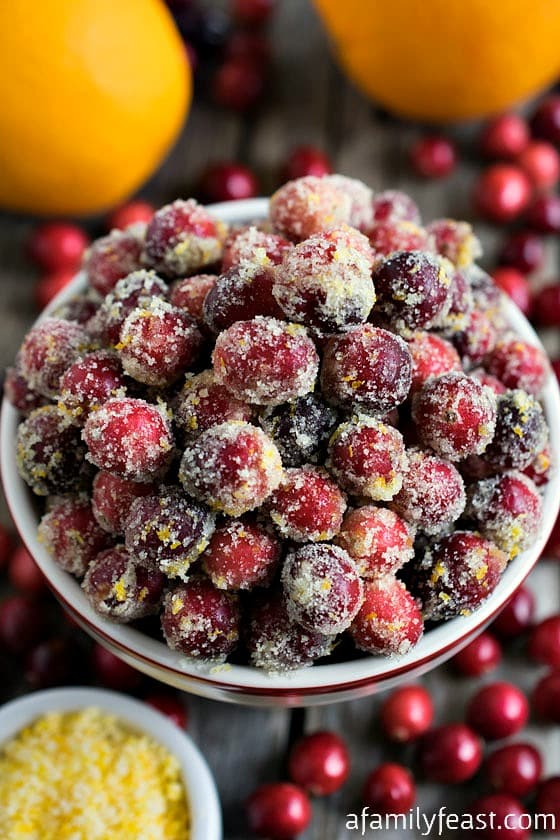 Orange Sugared Cranberries - A delicious, citrusy twist on the classic sugared cranberry recipe.  The orange flavor is a great complement to the sweet-tart cranberries!
