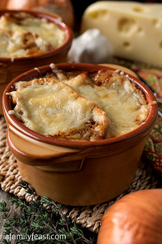 Quite possibly one of the best French Onion Soup recipes around! Super rich and flavorful with crusty toasted bread and melted Swiss cheese. YUM!