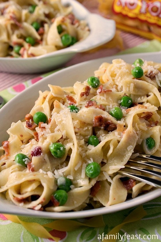 Straw and Hay (Paglia e Fieno) - A simple, classic Italian dish of pasta, peas and prosciutto in a light Parmesan cream sauce. 