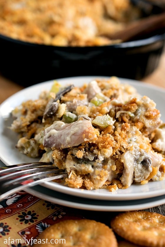 Baked Chicken Salad - An old family recipe - this casserole is fantastic! Tender chunks of rotisserie chicken and mushrooms in a creamy, zesty sauce and topped with Ritz crackers. So good!