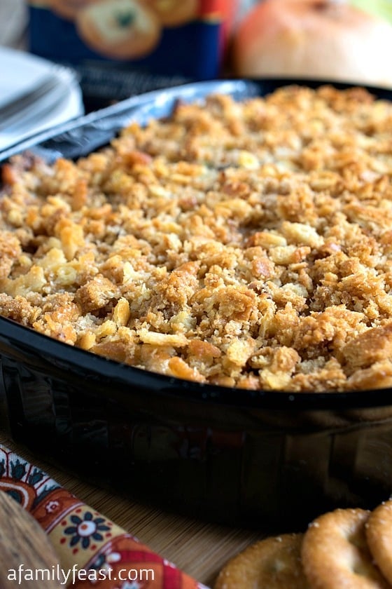 Baked Chicken Salad - An old family recipe - this casserole is fantastic! Tender chunks of rotisserie chicken and mushrooms in a creamy, zesty sauce and topped with Ritz crackers. So good!