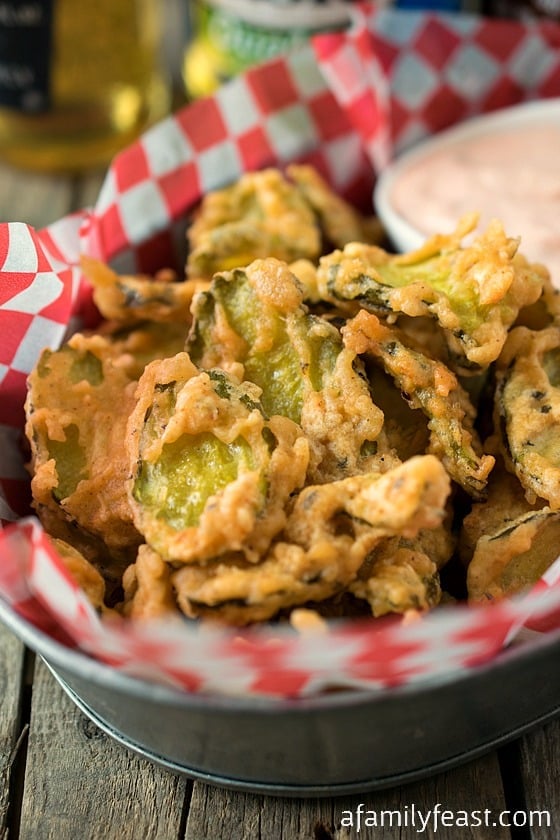Wicked Pickles - An addictively delicious beer battered, deep fried pickle appetizer served with a spicy dipping sauce!