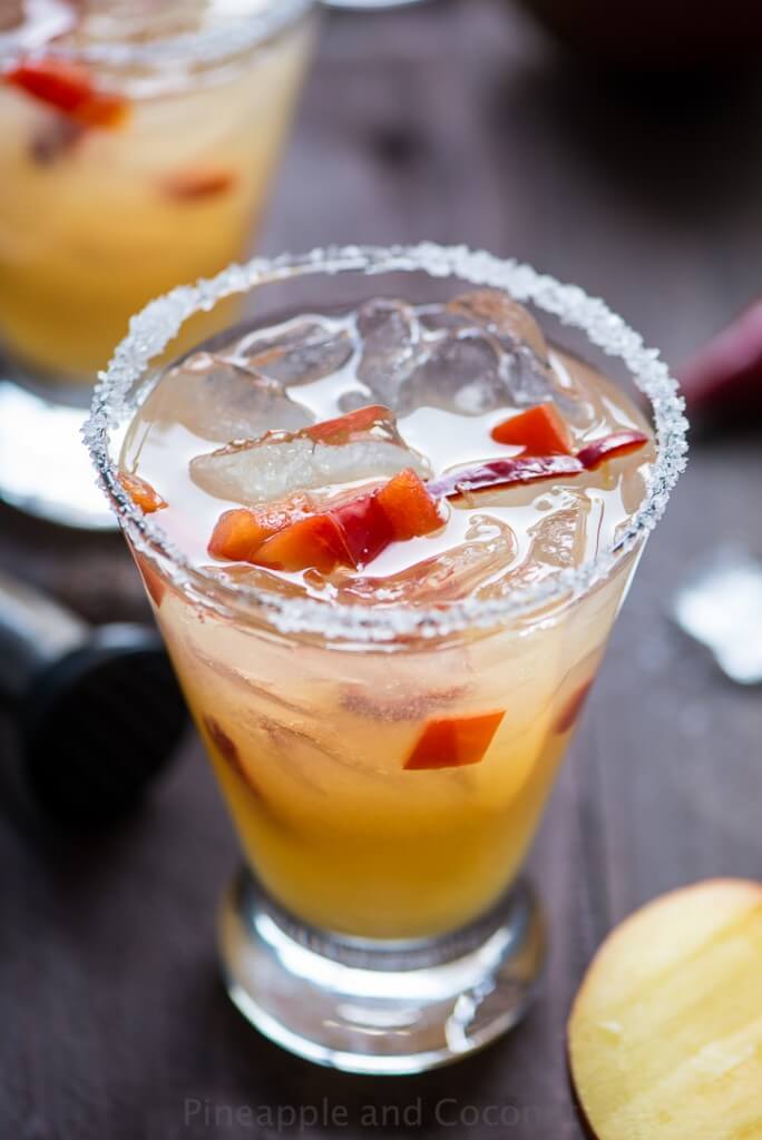 This chili pepper and mango margarita is one of over 30 refreshing margarita recipes in a collection on afamilyfeast.com
