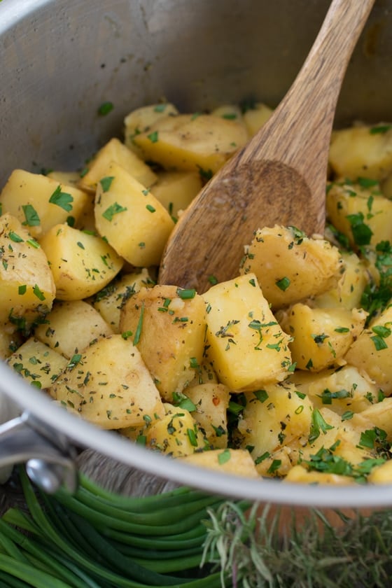 Herbed Boiled Potatoes - Fresh herbs and tender potatoes come together in a simple, quick side dish that is perfect for any family dinner!