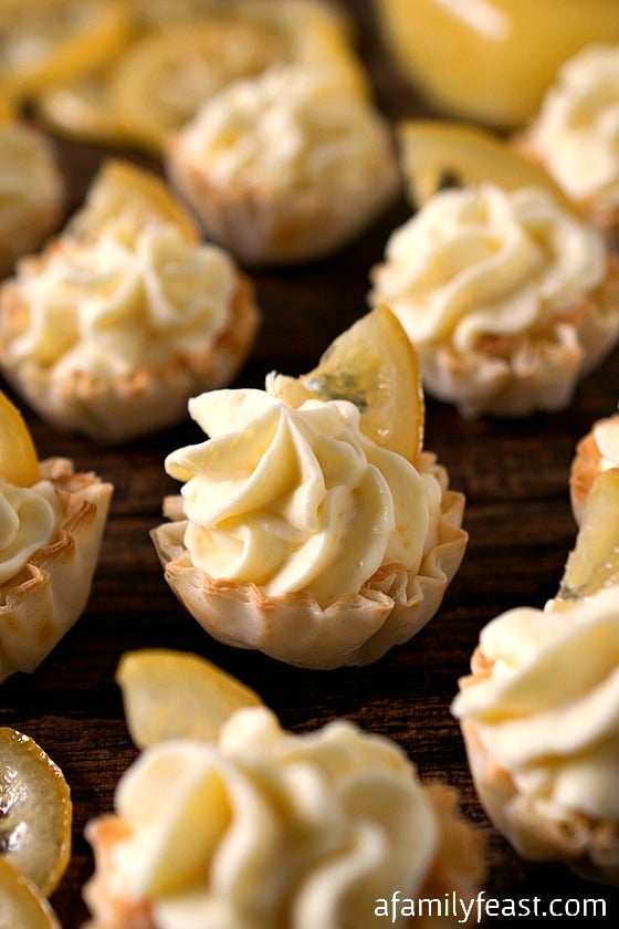 Lemon Mousse Cups - Creamy, sweet and lemony, these little bite-sized desserts are super simple to make!