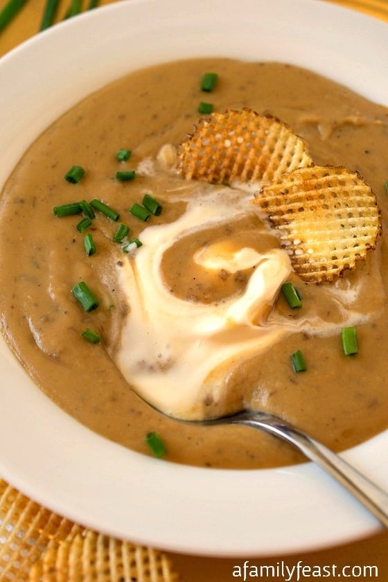 Roasted Potato Soup - This simple, creamy soup gets incredible flavor from roasting the potatoes first! A sprinkle of chives and some homemade waffle fries are the perfect finishing touch!