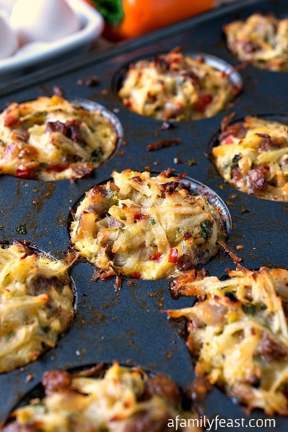Southwestern Breakfast Muffins - An easy and delicious breakfast on-the-go. Muffins made with cheese, sausage, hashbrowns, eggs and peppers!