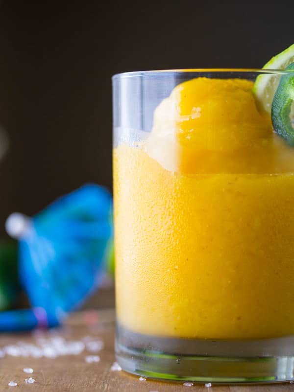 This spicy mango margarita is one of over 30 refreshing margarita recipes in a collection on afamilyfeast.com